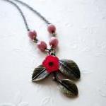 Leaf Pendant with Pink Glas..